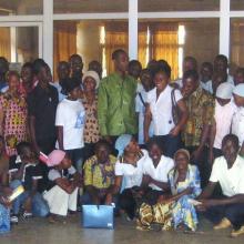 Library director with a group of successful trainees in the library.