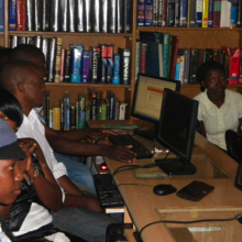 Young people learn computer and internet skills in National Library of Uganda in Kampala.