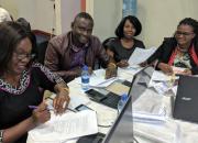 A group of Zambian public librarians writing a curriculum during an EIFL-PLIP workshop.