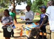 Student open access campaigners at Harare Institute of Technology used a megaphone to broadcast messages and a bicycle to distribute pamphlets during Open Access Week 2015. Photo by Jasper Lee Maenzanise.