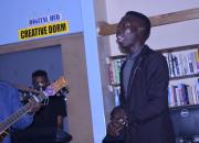 Singer and guitarist in Choma Provincial Library's 'Creative Dorm' space. 