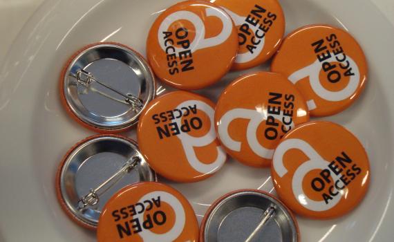 Group of open access lapel buttons. 