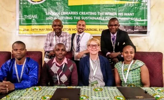 The IYALI team at the AfLIA conference: back, from left, Koi Kazungu, Kenya; Mustafa Tuhami, Egypt; Momoh Mansaray, Sierra Leone. Front, from left, Harouna Ahmadou Saliou Yerima, Cameroon; Joseck Olala, Kenya; Ramune Petuchovaite, EIFL, Joan Njogu, Kenya.