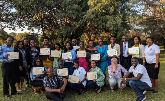 Group photo of Zambian public library trainers with certificates, after completing EIFL training of trainers programme.