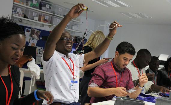 Young African public library innovators using tools during a hands-on experience in the National Library of Lithuania makerspace. Young African public library innovators using tools during a hands-on experience in the National Library of Lithuania makerspace.