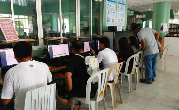 Overseas workers learn how to use computers and to apply online for their Overseas Employment Certificates in Butuan City Library. Overseas workers learn how to use computers and to apply online for their Overseas Employment Certificates in Butuan City Library.