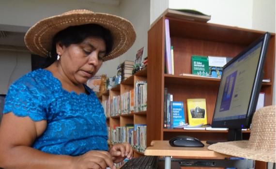 Woman artist who uses the library’s computers to photograph and market her hand-made hats.