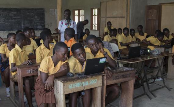 children at school working on computers