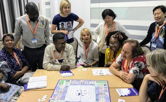 IFL guest blogger Jane Secker, standing, second from left, plays The Publishing Trap with EIFL General Assembly delegates. 