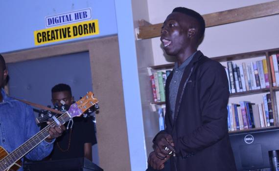 Singer and guitarist in Choma Provincial Library's 'Creative Dorm' space. 